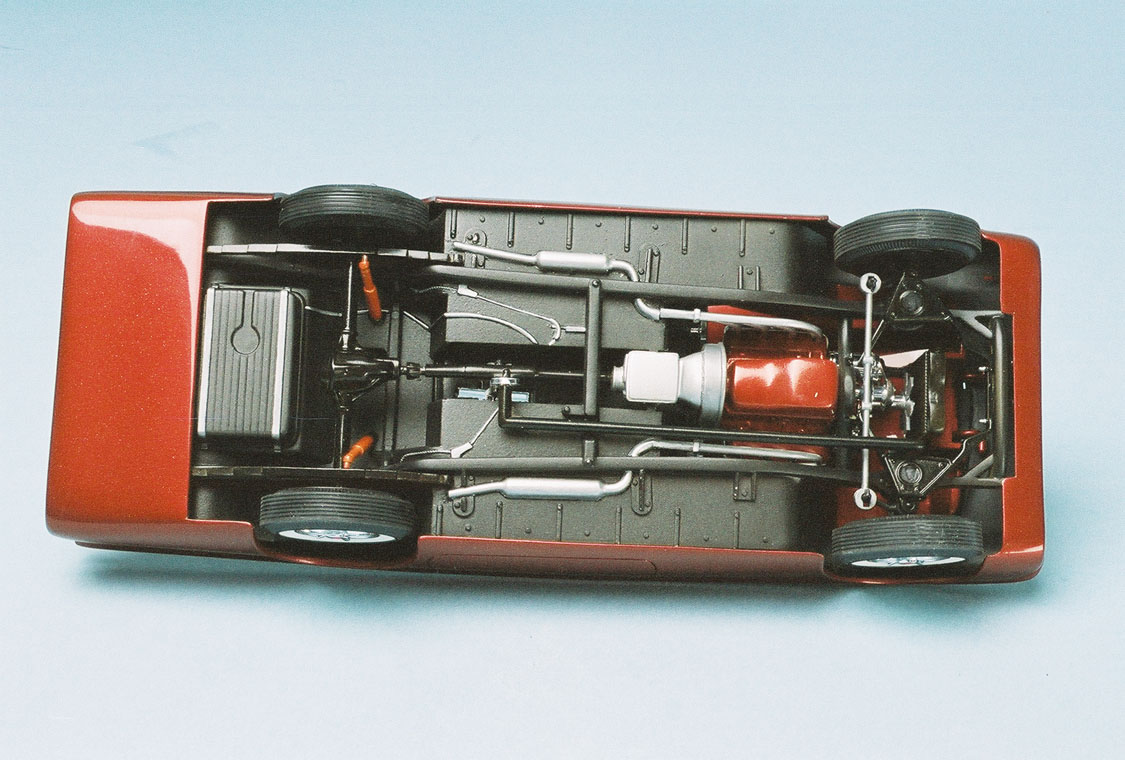 The chassis was painted a special mixture of silver and black to produce a dark grey color. Multiple steel colors were used. Before the dark colors were applied, the exhaust system was painted in Metallizer and then masked.  